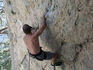 Toro warms up on a 5.12c