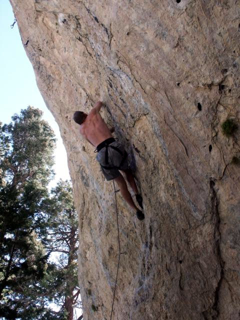 Toro warms up on a 5.12c